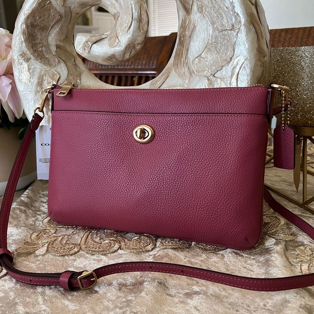 Brand new Coach pebble leather top zip crossbody